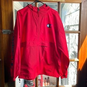 Red champions jacket good for styling and rain has some stains but no rips